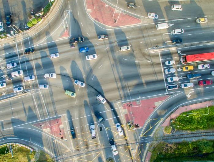 Cars crossing a traffic intersection