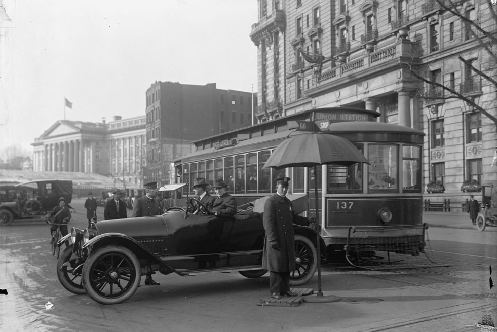 Manually changed STOP and GO sign in early 20th century Washington DC 